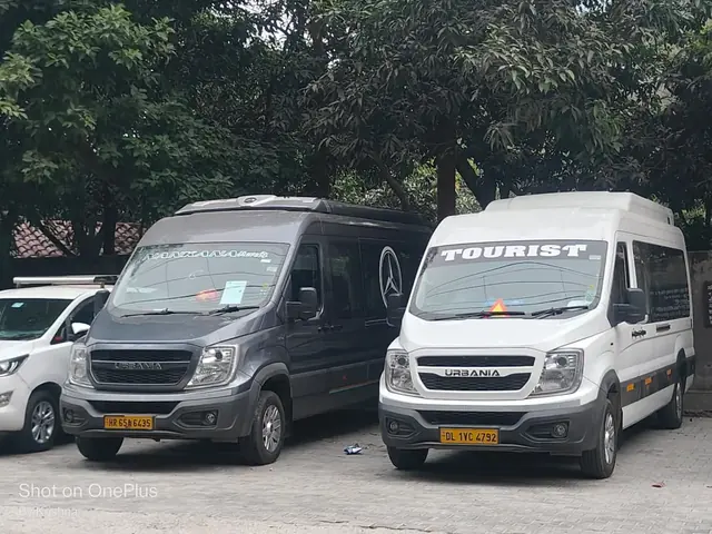Two Force Urbania minibuses for group travel, front view
